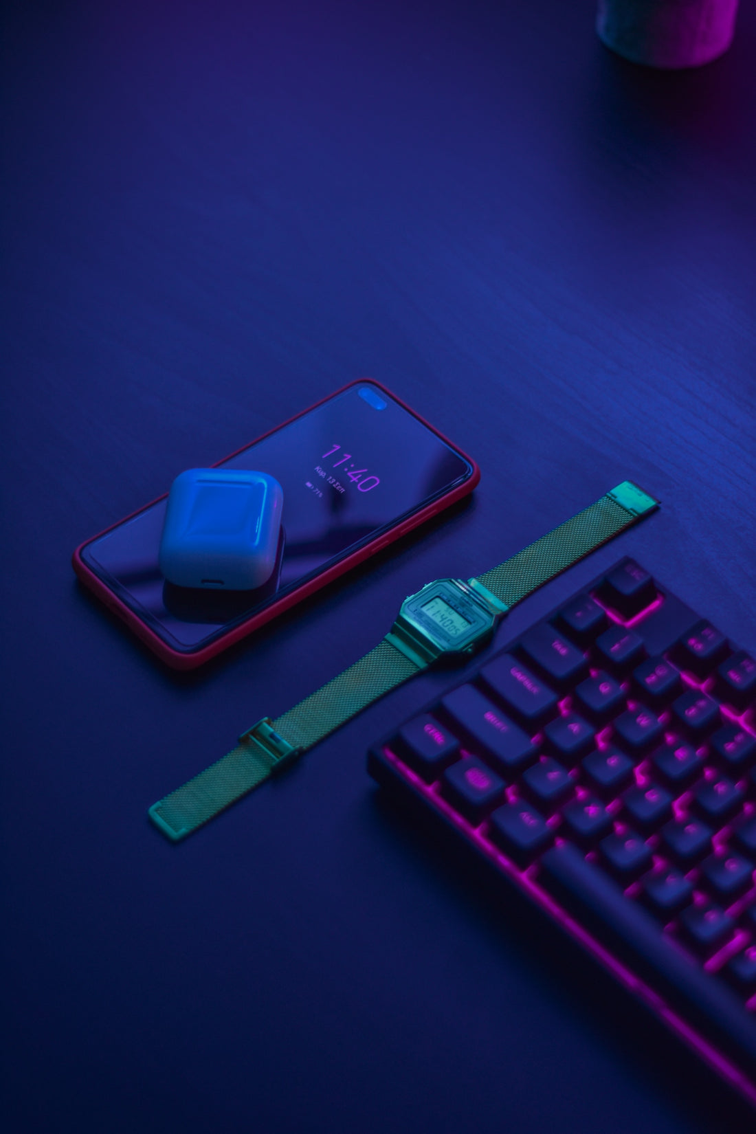 blue apple watch with green strap