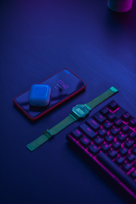 blue apple watch with green strap