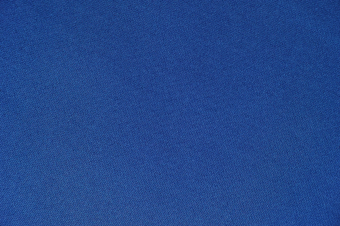 blue textile in close up photography