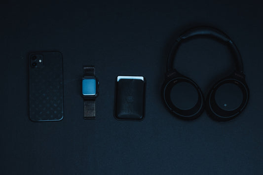 black and blue iphone case on black surface