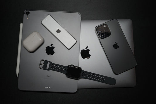 a couple of ipads sitting next to each other