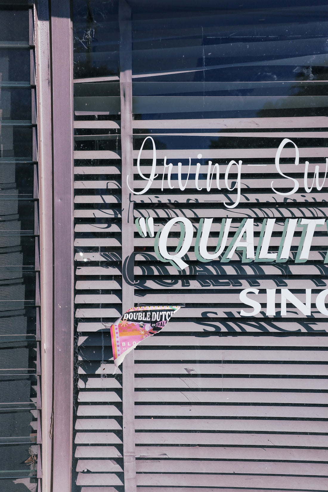 A store front with a sign on it