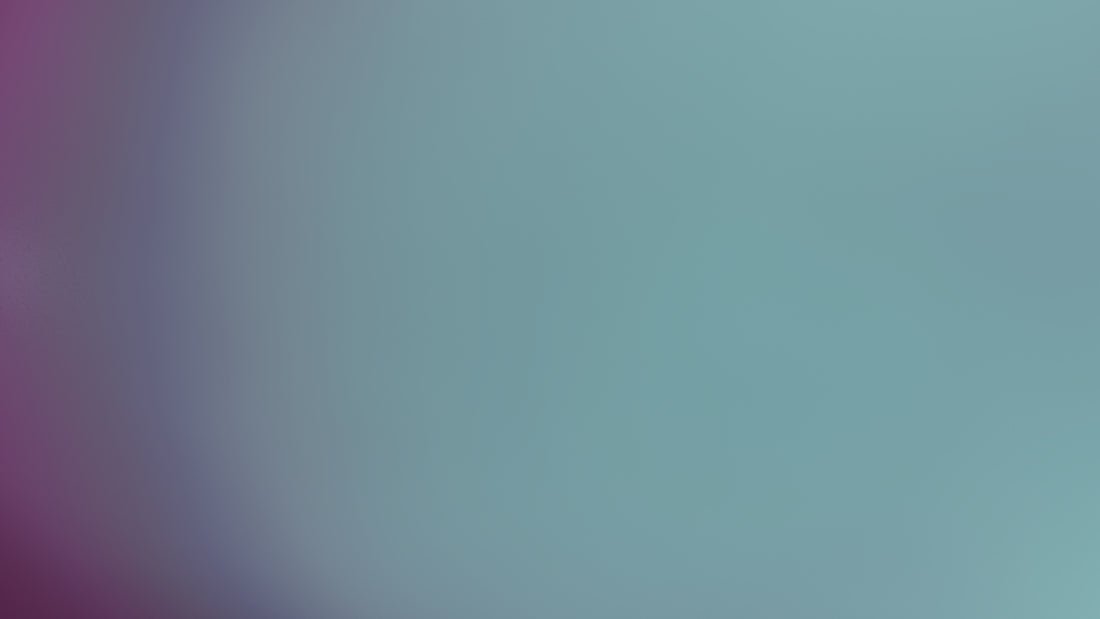 Blurred background transitions from purple to blue.