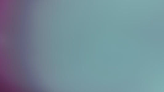 Blurred background transitions from purple to blue.